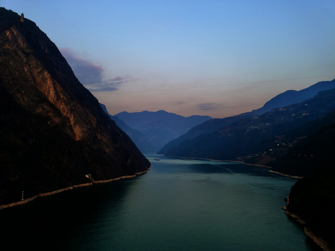 Misty mountains along the river valley in southwestern China